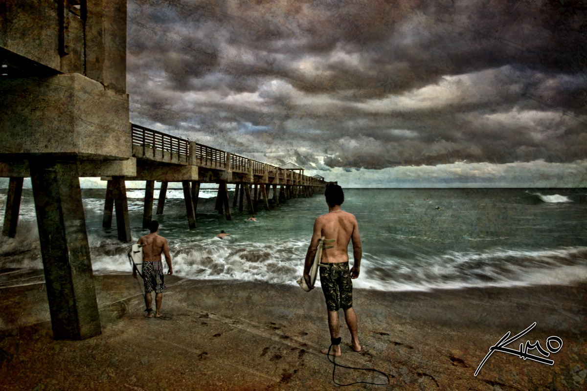 Surfers in the Storm – Juno Beach Pier