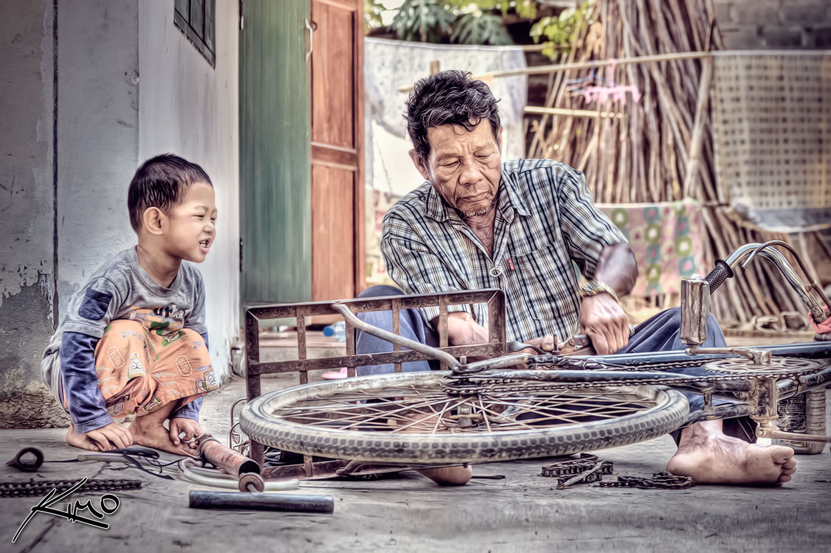 Ton and Grandpa Fixing Bike