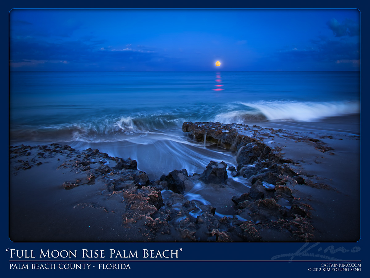 Full Moon Rising Over Beach Rocks During Crashing Waves
