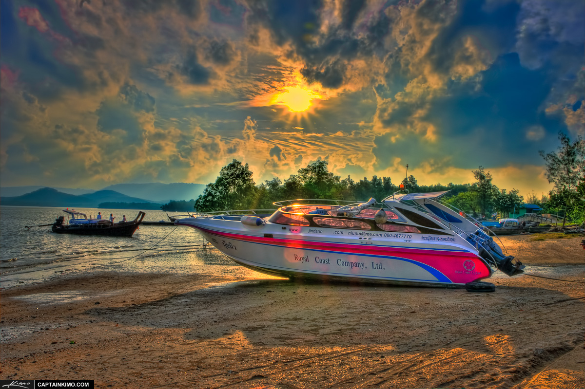 Speed Boat at Low Tide Coconut Island Phuket Thailand