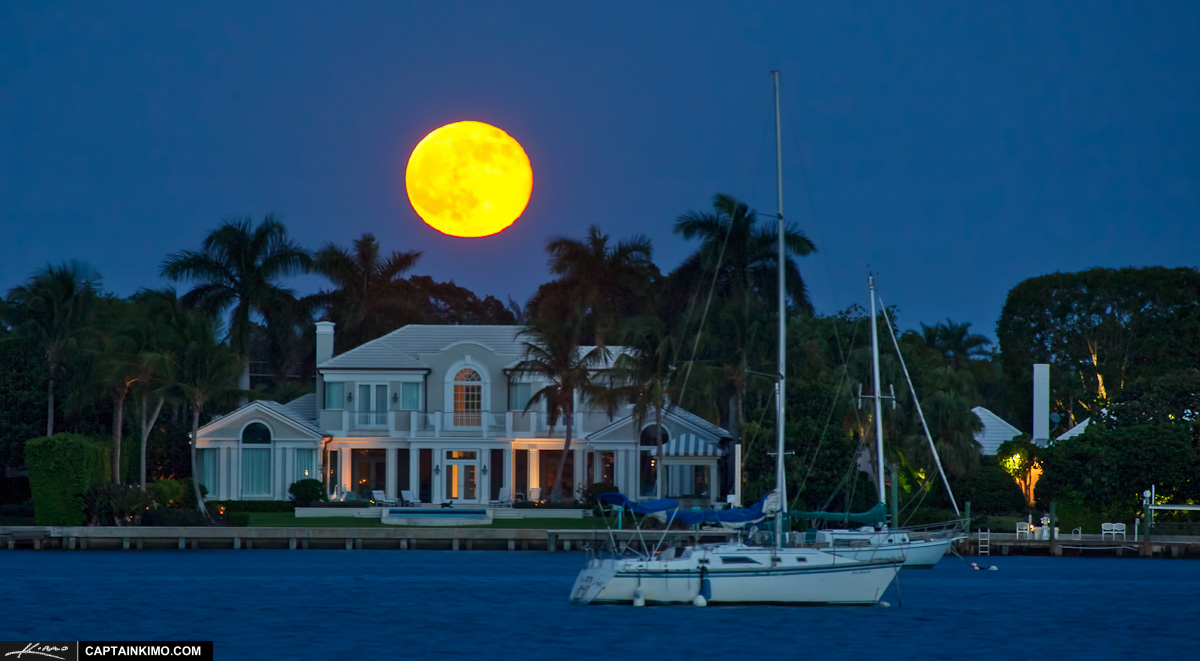 Full Moon Rising Over House and Sail Boat at Singer Island Florida