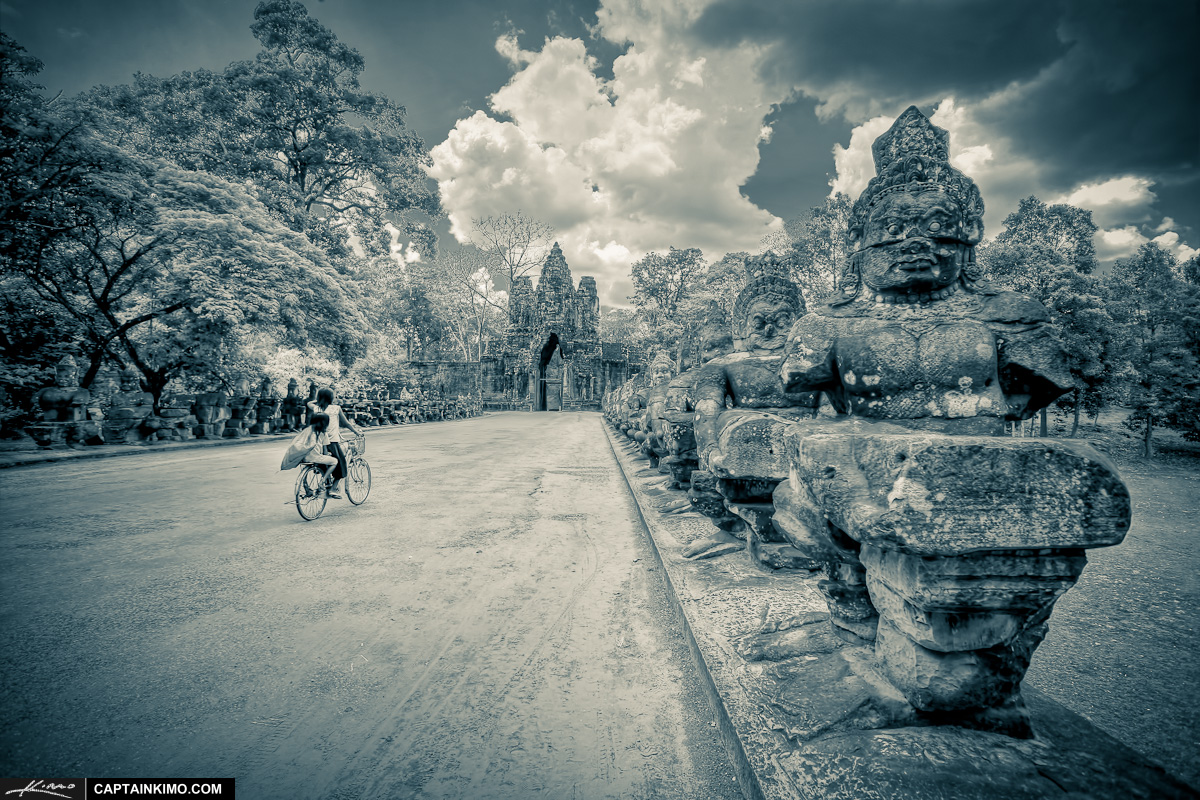 Girls Riding Bike at Angkor Wat Siem Reap Cambodia