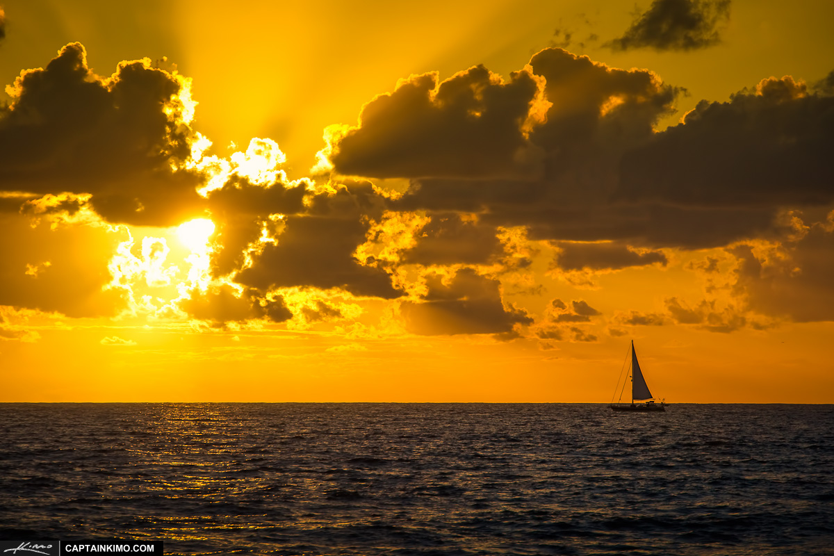Sailboat Sailing Over Atlantic Ocean During Sunrise