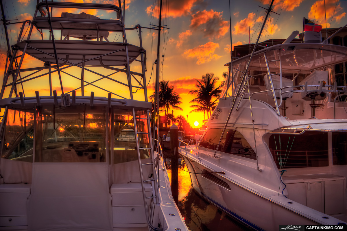 Sunset Between Two Yachts at Riverwalk Marina Jupiter Florida