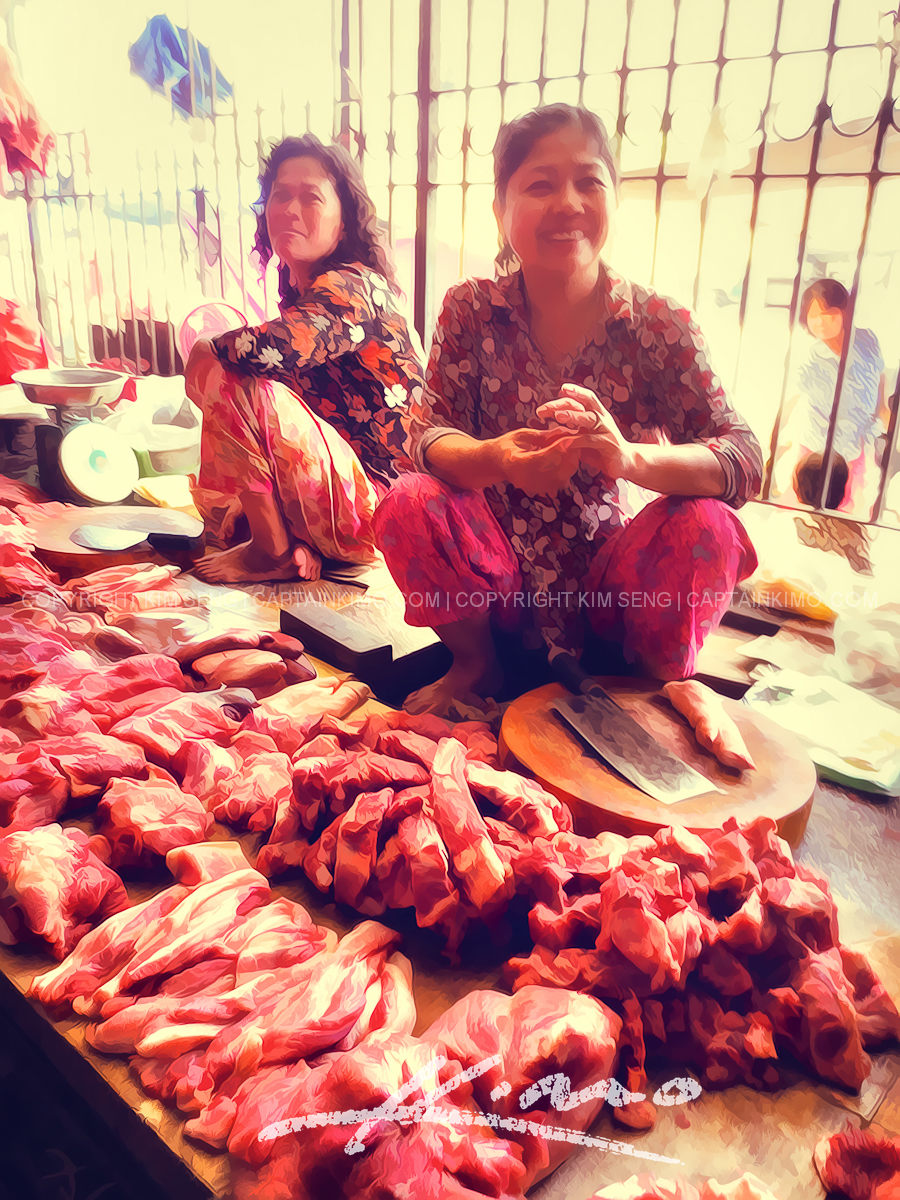 Cambodian Butcher Woman at the Market in Battambang Cambodia