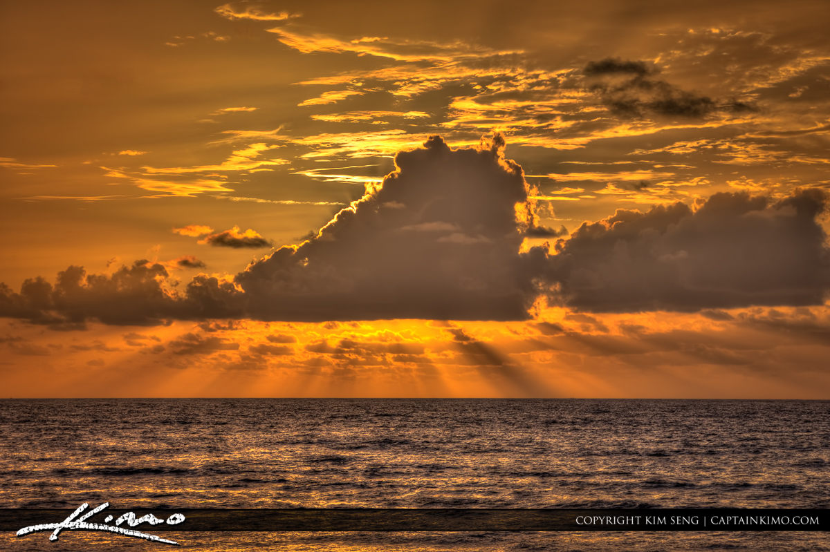Rays of Hope Over Ocean in Florida Beach