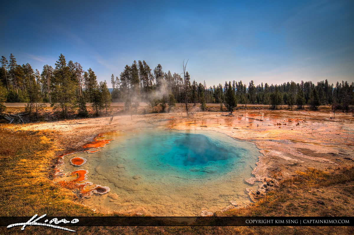 Crystal-clear blue Geyser at Yellowstone National Park