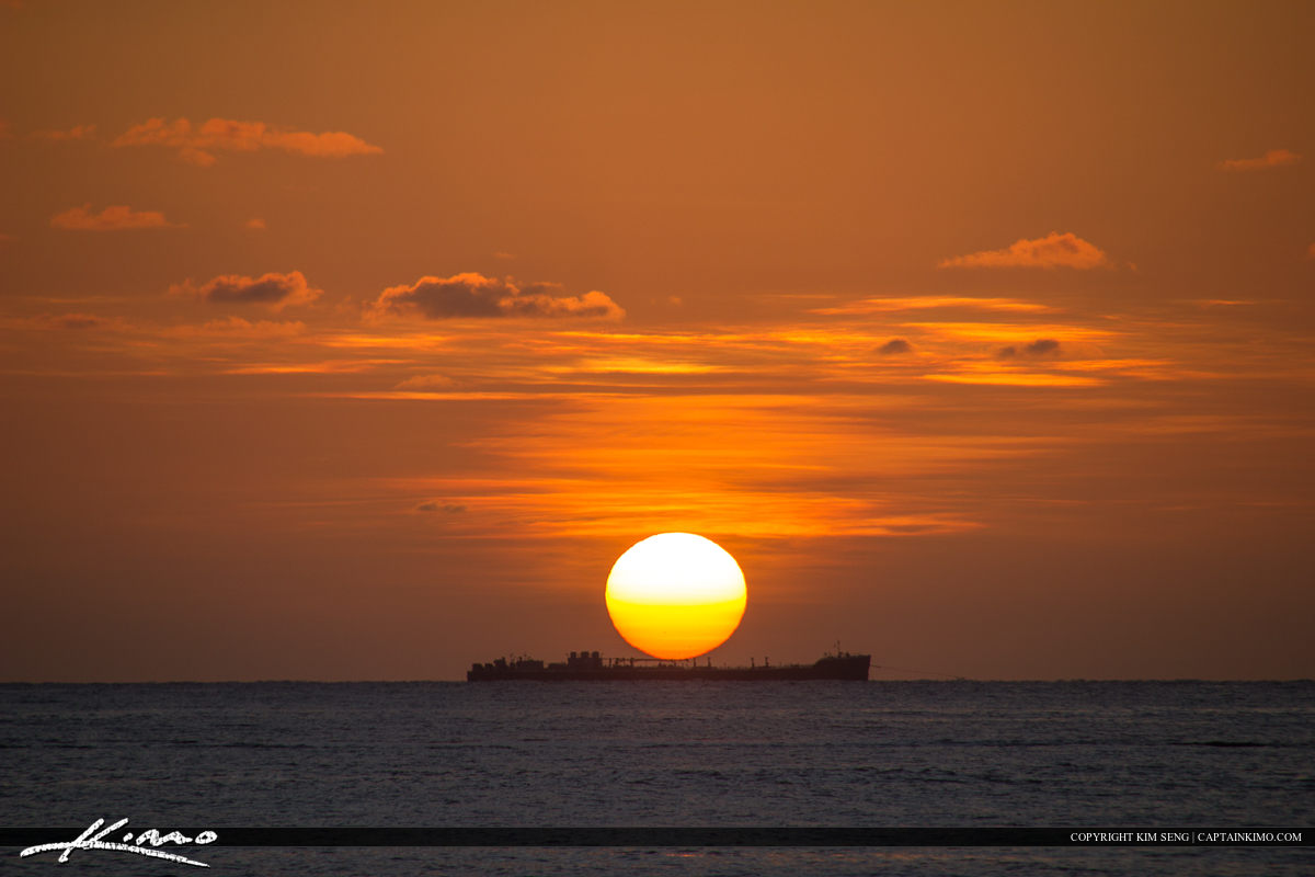 Cargo Ship Sunrise Over Atlantic Ocean
